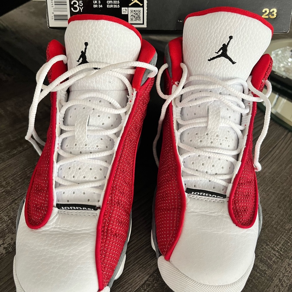 Air Jordan 13’s  Retro Red and White Athletic Shoes